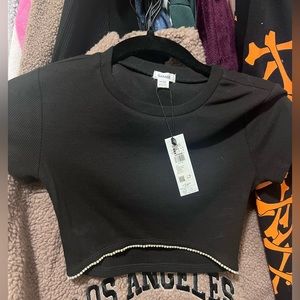 Black crop top with diamond cut bottom